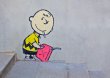 Charlie Brown Firestarter by Banksy